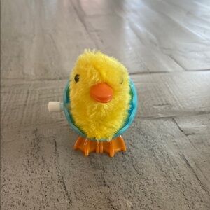 Wind-Up Yellow Chick Toy in blue egg